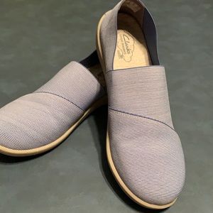 Blue striped Clark’s Cloudsteppers slip ons
